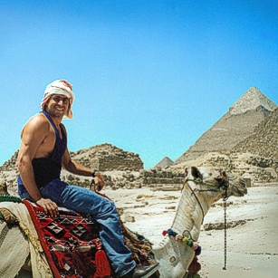 Omnimundi member on a Camel near the Giza Pyramids