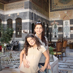 Mother and daughter visits a luxury hotel in Damascus during a short travel to Syria