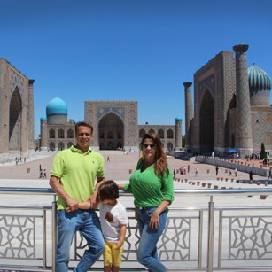Omnimundi Famili standing in Registan Square in Uzbekistan during a Silk Road travel