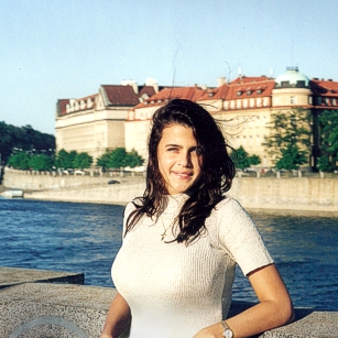Woman in the board of Vltava river in Prague