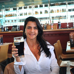 Mrs Omnimundi beauty having a Guinness bear in a restaurant during her travel in Dublin, Ireland