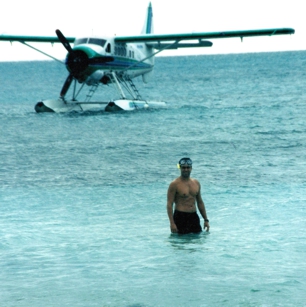 A tourist comming out of his luxury Sea Plane in Green Island in Australia